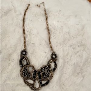 Gold and black necklace